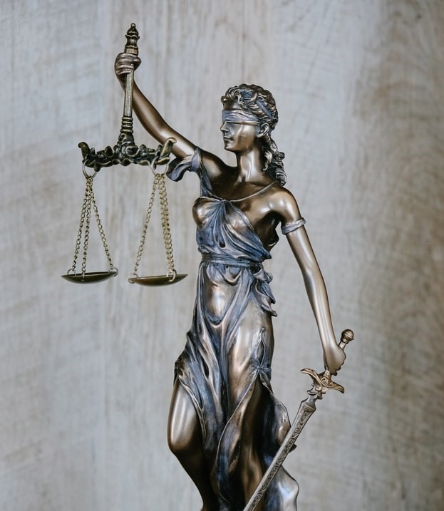 Statue of Lady Justice holding scales.